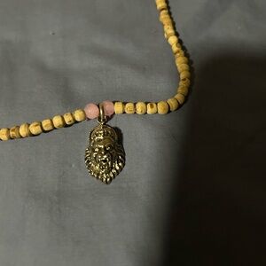 Gorgeous lion face necklace with wooden and Pink Beads